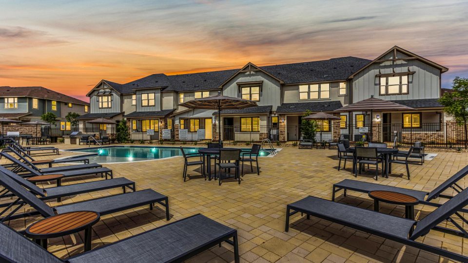 the pool at sunset at The Town Arlington